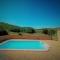 Maisons de vacances Maison en pierre avec piscine : photos des chambres
