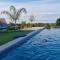 Appartements Rez de villa tout confort avec piscine : photos des chambres