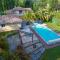 Maisons de vacances Superbe villa avec piscine dans un cadre verdoyant : photos des chambres
