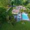 Maisons de vacances Superbe villa avec piscine dans un cadre verdoyant : photos des chambres