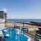 Maisons de vacances Echappee relaxante avec vue sur la mer : photos des chambres