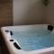 Maisons de vacances Gite avec SPA privatif : photos des chambres