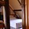 Hotels Logis Auberge A La Tete De Lard : photos des chambres
