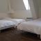 Hotels Au Pigeon Blanc : photos des chambres