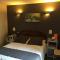 Hotels Auberge Du Cheval Blanc - Les Collectionneurs : photos des chambres