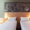 Hotels Ibis Villefranche Sur Saone : photos des chambres
